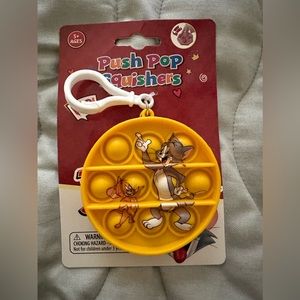 Tom and Jerry yellow push pop squishers key chain new